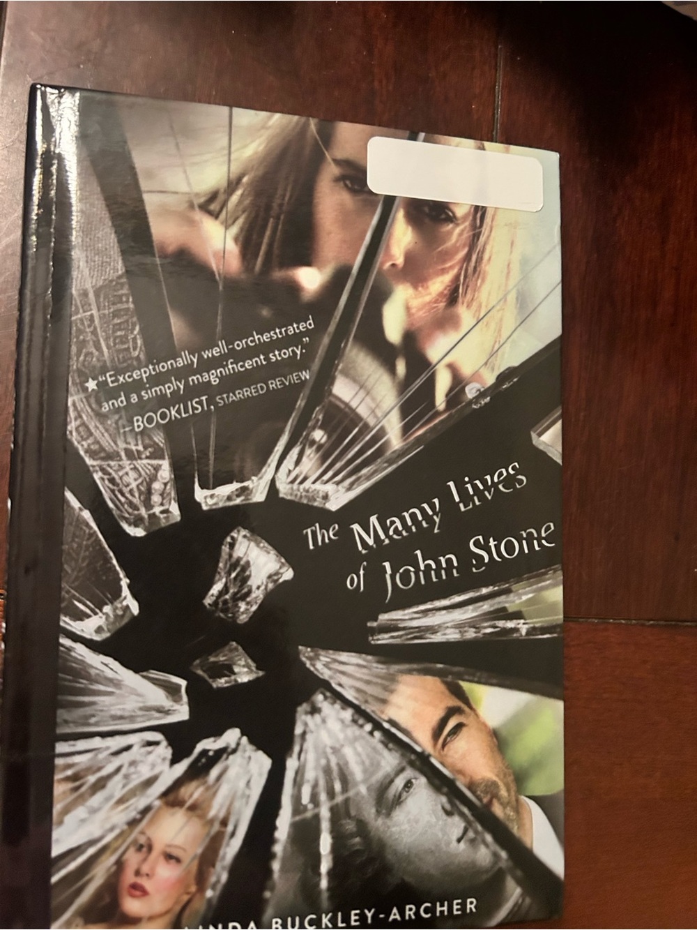 The Many Lives of John Stone Hardcover Book - Black & White Cover